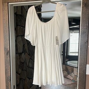 Chic White Mini Dress with Flowing Sleeves